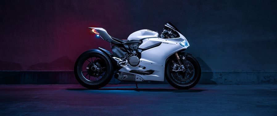 De motorrijdersbekleding, een economische personalisatie 2 Ducati 1199S Panigale motorfiets 100732 1024x768 e1673704632505